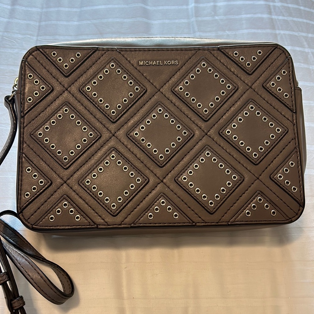 Michael Kors gray with silver details.